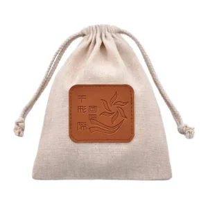 Branded Linen Drawstring Bag with Debossed Logo2